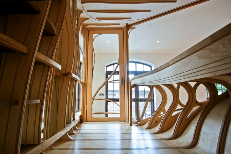 Illustration for article titled Bendy Wooden Room Snaps Together Like Tetris, Takes Over House